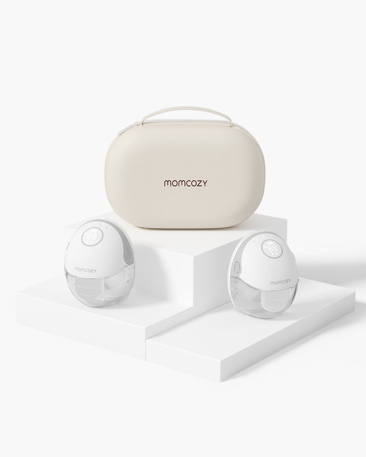 Momcozy M6 hands-free breast pump set with stylish carrying case, designed for convenience.