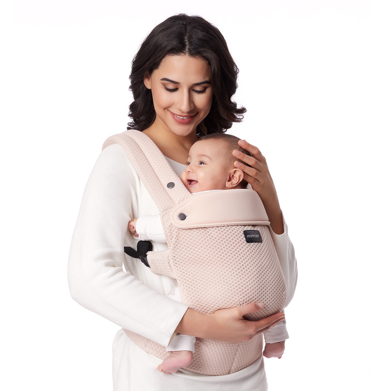 Momcozy PureHug baby carrier in beige mesh, worn by mother, comfortable design for babywearing.
