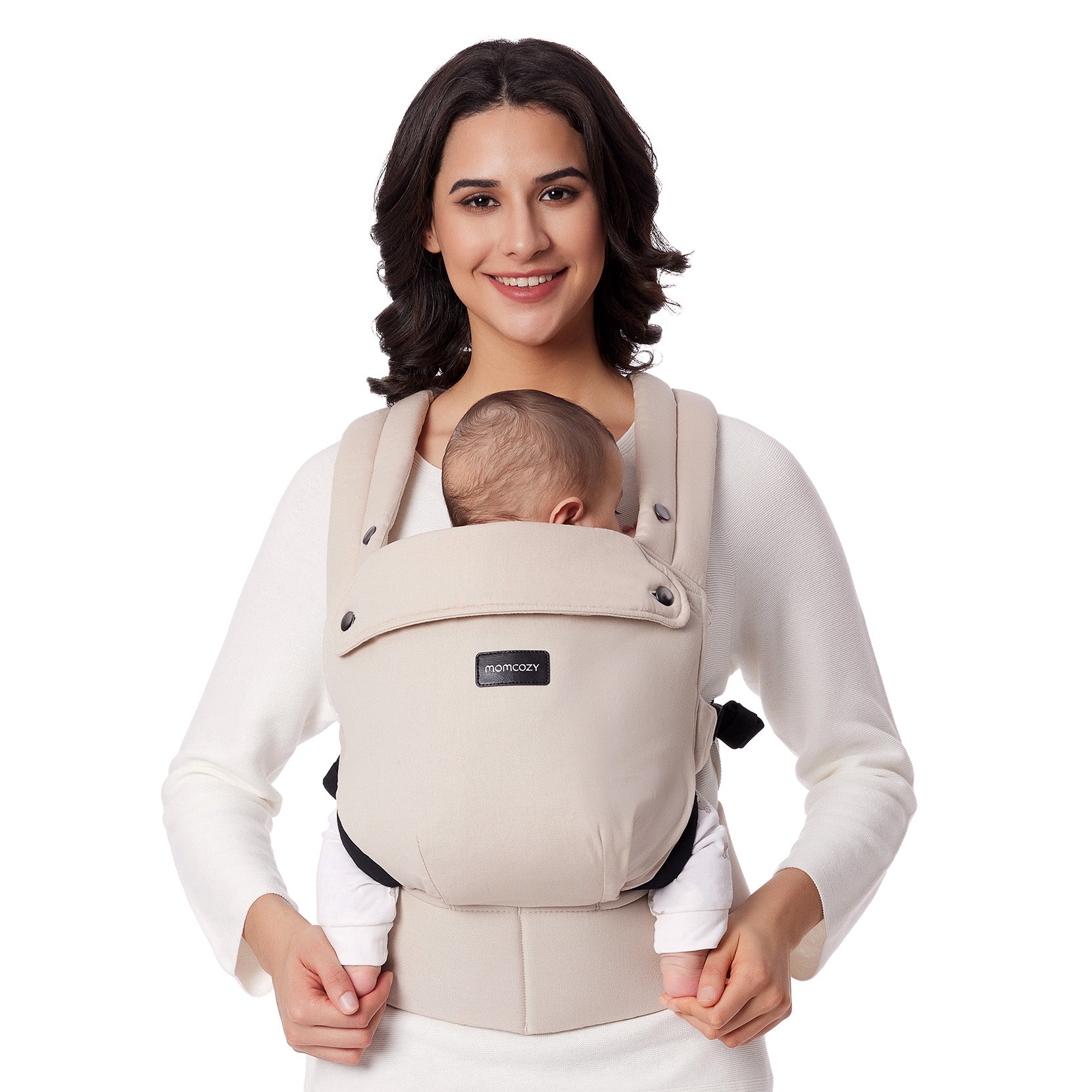 Momcozy PureHug baby carrier in cream color, comfortable design, babywearing by mother, with Momcozy logo.
