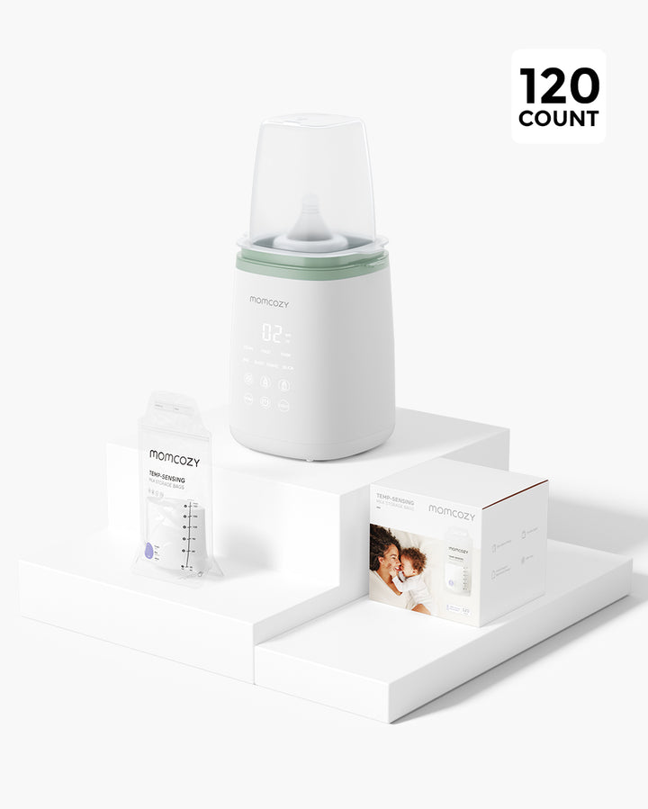 Momcozy 6-in-1 Fast Baby Bottle Warmer, milk storage bag, and product packaging box with a mother and baby image, on a white platform. Label indicating 120 count.
