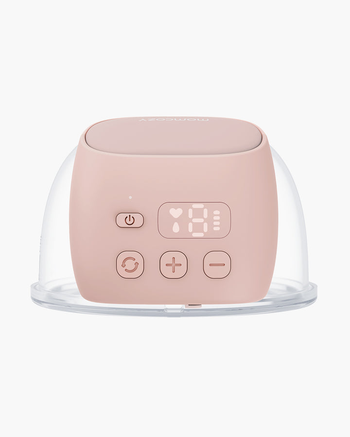 S9 Pro Wearable Breast Pump top view in soft pink with LED screen and clear milk collector.