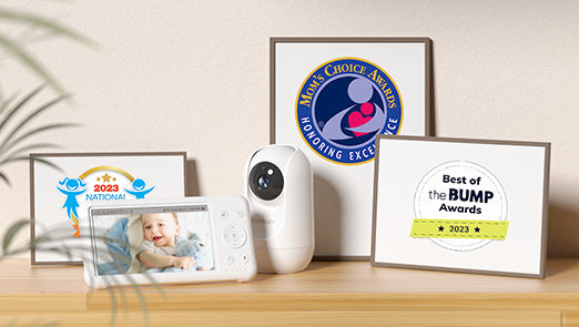 1080P High-Performance Video Baby Monitor with Award Certificates, displaying baby's image on the screen