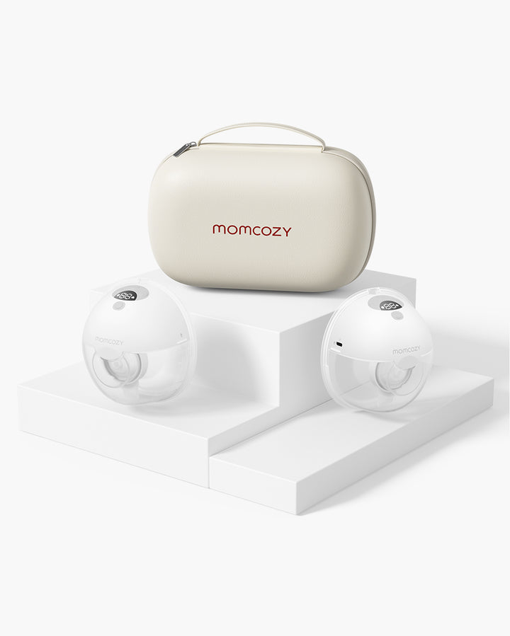 Momcozy M5 Wearable Breast Pump and storage case on a white pedestal, sleek design.