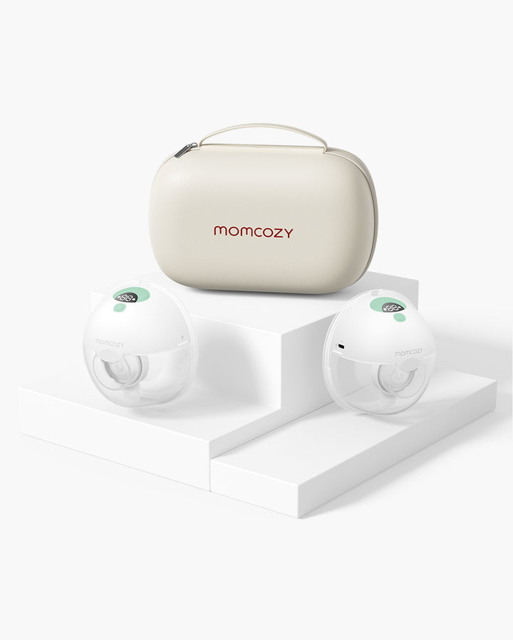 Momcozy M5 Wearable Breast Pump and storage case on pedestal, showcasing elegant design.