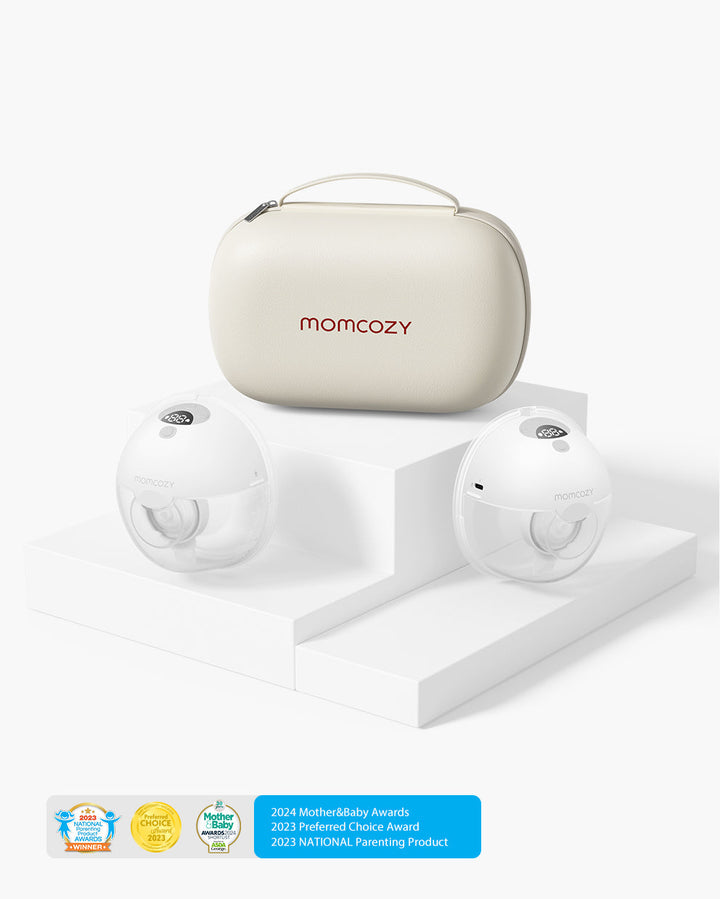 Momcozy M5 Wearable Breast Pump set with two individual pumps and a beige carrying case, showcasing award badges below