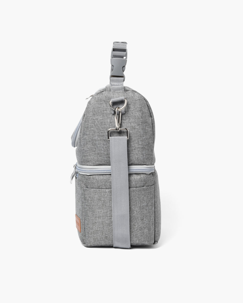 Gray breastmilk cooler bag with detachable shoulder strap and zip closure for easy transport.